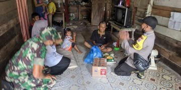 Polres Tanah Laut Buktikan Wujud Kekompakan TNI POLRI dengan Lakukan Baksos Bersama