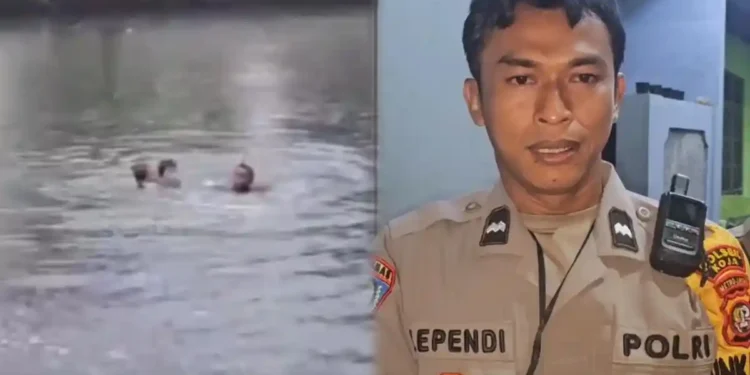 Aksi Menegangkan Aipda Ependi Anggota Polsek Koja Selamatkan Anak Hampir Tenggelam Terbawa Arus Kali